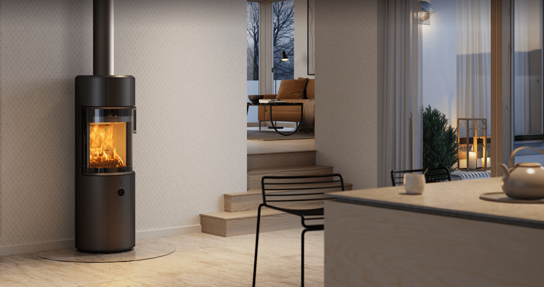 Czarny okrągły piec opalany drewnem Scan 67-1300 w jasnym skandynawskim wnętrzu kuchni